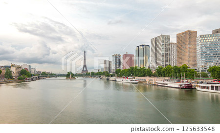 The Statue of Liberty and the Eiffel Tower timelapse hyperlapse with modern buildings. Paris, France 125633548