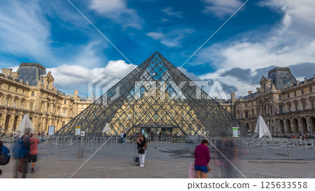 Large glass pyramid and the main courtyard of the Louvre Museum timelapse hyperlapse. Paris, France 125633558