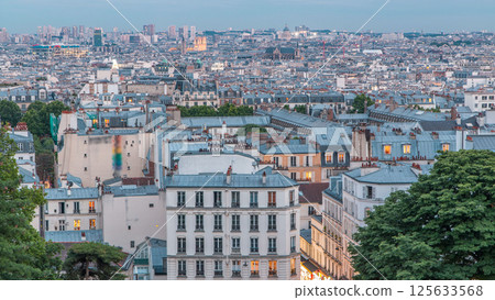 Beautiful Paris cityscape day to night timelapse seen from Montmartre. Paris, France Beautiful Paris cityscape day to night timelapse seen from Montmartre. Paris, France 125633568