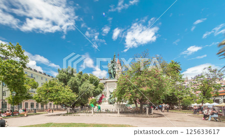 Aerial drone view of people relaxing at Dom Luis Garden in the Baixa District of Lisbon, Portugal on a warm spring day with surrounding urban cityscape in the background Aerial drone view of people relaxing at Dom Luis Garden in the Baixa District of Lisbon, Portugal on a warm spring day with surrounding urban cityscape in the background 125633617