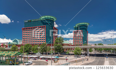 Aerial timelapse hyperlapse of Centro Colombo and modern office buildings in Lisbon. Portugal. Aerial timelapse hyperlapse of Centro Colombo and modern office buildings in Lisbon. Portugal. 125633630