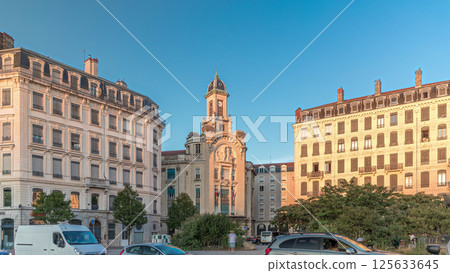 Hyperlapse of Place Antonin Jutard and the Mutuality Palace facade from the waterfront near Guillotiere Bridge in Lyon, France. 125633645