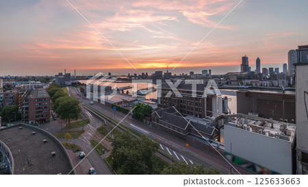 Aerial panoramic view over Maashaven day to night timelapse in Rotterdam. 125633663