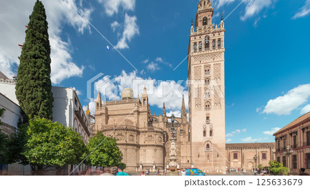 Seville Cathedral and Giralda Tower timelapse hyperlapse, Spain Seville Cathedral and Giralda Tower timelapse hyperlapse, Spain 125633679