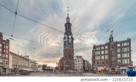 Munttoren tower and flowers market. Panoramic timelapse hyperlapse of Amsterdam city center. Netherlands 125633713
