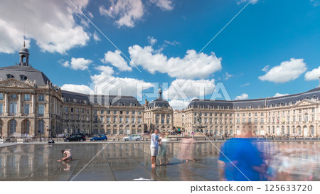 Place de la Bourse and Miroir d'eau timelapse hyperlapse in Bordeaux, France, reflecting historic architecture Place de la Bourse and Miroir d'eau timelapse hyperlapse in Bordeaux, France, reflecting historic architecture 125633720