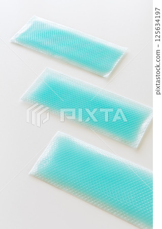 Cooling gel sheet for when you have a fever on a white background 125634197