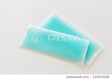 Cooling gel sheet for when you have a fever on a white background 125634200