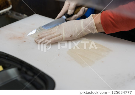 Scene of preparing live squid from Hakodate 125634777