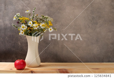 Floral composition of wild herbs and flowers on a wooden table in a rustic style, autumn background, tansy, Floral composition of wild herbs and flowers on a wooden table in a rustic style, autumn background, tansy, 125634841