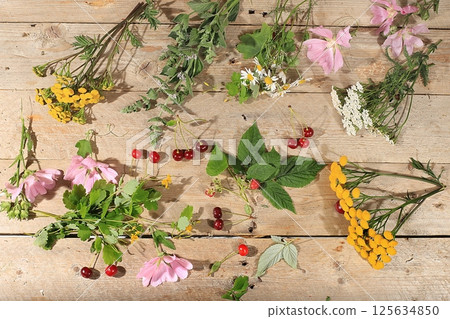 Floral composition of wild herbs and flowers on a wooden table in a rustic style, autumn background, tansy, Floral composition of wild herbs and flowers on a wooden table in a rustic style, autumn background, tansy, 125634850
