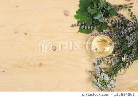 Floral composition of wild herbs and flowers on a wooden table in a rustic style, autumn background, tansy, Floral composition of wild herbs and flowers on a wooden table in a rustic style, autumn background, tansy, 125634861