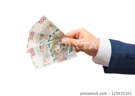 Polish 500 PLN banknotes in hand 125635161