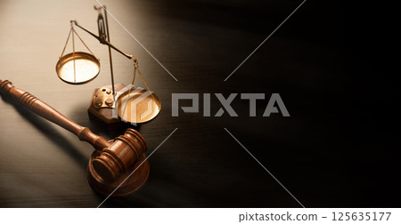 Weight scale and wooden gavel in background Weight scale and wooden gavel in background 125635177