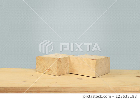 Abstract background with natural wooden podiums and long shadows on a pink wall, an empty showcase for cosmetic products demonstration or presentation, minimal ecology concept, selective focus 125635188