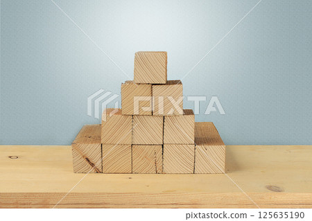 Abstract background with natural wooden podiums and long shadows on a pink wall, an empty showcase for cosmetic products demonstration or presentation, minimal ecology concept, selective focus 125635190