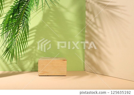 Abstract background with natural wooden podiums and long shadows on a pink wall, an empty showcase for cosmetic products demonstration or presentation, minimal ecology concept, selective focus 125635192