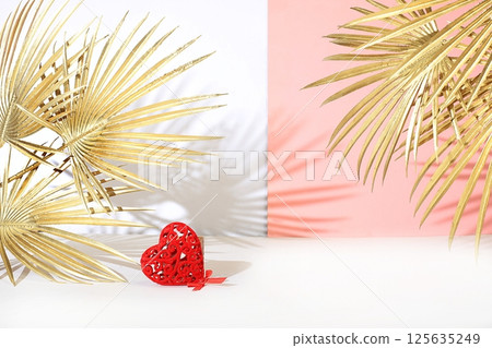Minimal abstract background for cosmetic products presentation.Empty premium podium with shadows of tropical palm leaves on beige wall,template for design,pedistal display podium,selective focus Minimal abstract background for cosmetic products presentation.Empty premium podium with shadows of tropical palm leaves on beige wall,template for design,pedistal display podium,selective focus 125635249