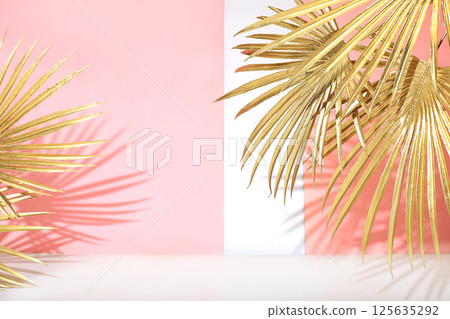 Minimal abstract background for cosmetic products presentation.Empty premium podium with shadows of tropical palm leaves on beige wall,template for design,pedistal display podium,selective focus Minimal abstract background for cosmetic products presentation.Empty premium podium with shadows of tropical palm leaves on beige wall,template for design,pedistal display podium,selective focus 125635292