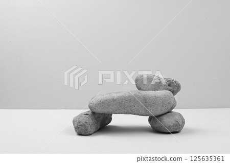 Empty premium podium with stone coasters, Minimal abstract background for cosmetic products presentation. template for design, pedestal podium, selective focus Empty premium podium with stone coasters, Minimal abstract background for cosmetic products presentation. template for design, pedestal podium, selective focus 125635361