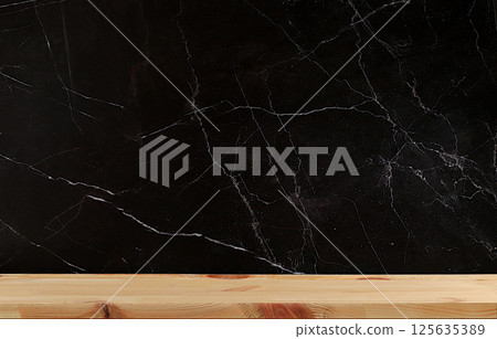 Empty wooden table with black marble wall with space for text, rustic style, eco concept, kitchen mockup for design and showcase for product display, selective focus Empty wooden table with black marble wall with space for text, rustic style, eco concept, kitchen mockup for design and showcase for product display, selective focus 125635389