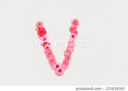 A letter V made from real fresh flowers. Creative floral font concept. Unique collection of letters and numbers for design. Spring, summer, autumn and valentines, creative idea, A letter V made from real fresh flowers. Creative floral font concept. Unique collection of letters and numbers for design. Spring, summer, autumn and valentines, creative idea, 125636365