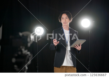 Staff preparing backstage 125636667