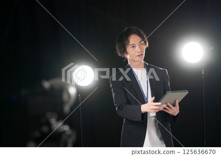 Staff preparing backstage Staff preparing backstage 125636670