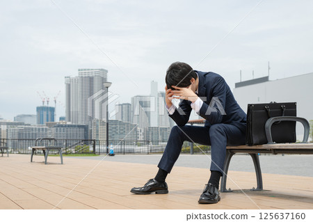 depressed businessman 125637160