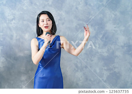 Woman singing a song 125637735