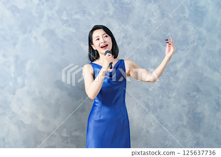 Woman singing a song 125637736