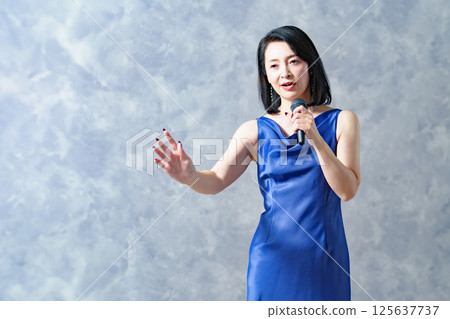 Woman singing a song 125637737