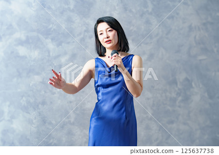 Woman singing a song 125637738