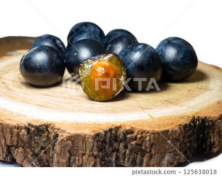fruit of Blackthorn. Type of plum genus. early fruit on a white background. Tart sour taste. 125638018
