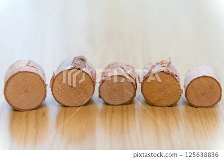 Copy space for five characters made of logs Copy space for five characters made of logs 125638836