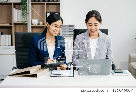 Working team meeting concept, business using laptop and smart phone and digital tablet computer with digital marketing media in virtual icon Working team meeting concept, business using laptop and smart phone and digital tablet computer with digital marketing media in virtual icon 125640007