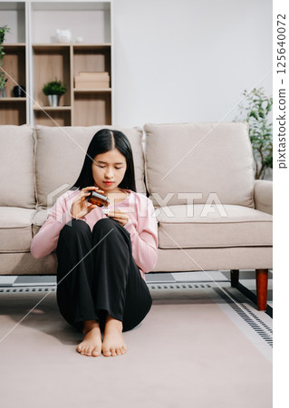 woman sit Depression Standing by window and anxiety Copy space. woman sit Depression Standing by window and anxiety Copy space. 125640072