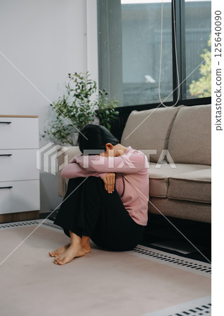woman sit Depression Standing by window and anxiety Copy space. woman sit Depression Standing by window and anxiety Copy space. 125640090