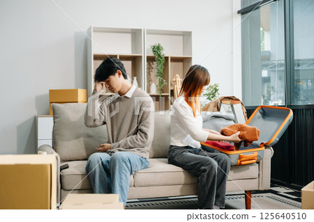 Divorce. Asian couples are desperate and disappointed after marriage. Husband and wife are sad, upset and frustrated after quarrels. 125640510