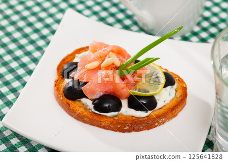 Canape with salmon 125641828