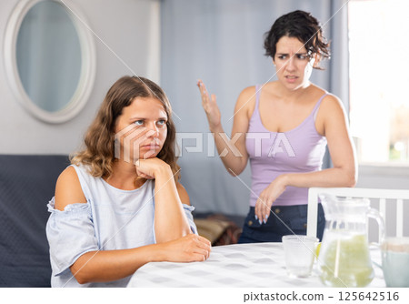 Young female LGBT couple quarreling at home 125642516