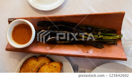 Popular dish of Catalan cuisine called Calso 125642602