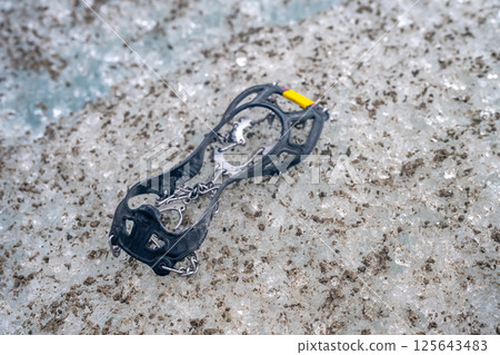 Selective focus on chain spikes used for added traction on ice.  125643483