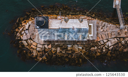 Direct overhead view of Rockland Breakwater Lighthouse in harbor on the Gulf of Maine  125643530
