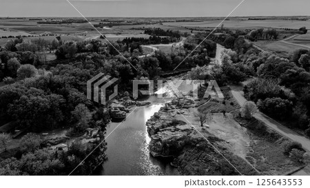 Drone flying over Split Rock Creek running through Palisades State Park in Garretson, South Dakota Drone flying over Split Rock Creek running through Palisades State Park in Garretson, South Dakota 125643553