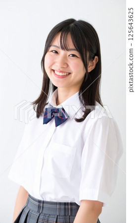 Smiling female high school student 125643625