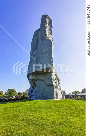 Massive gray stone rock monument sculpture statue Brest Fortress Belarus. Massive gray stone rock monument sculpture statue Brest Fortress Belarus. 125643748
