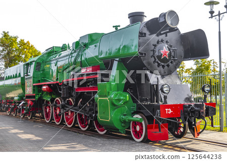Green classic vintage retro train trains steam locomotive locomotives Belarus. 125644238