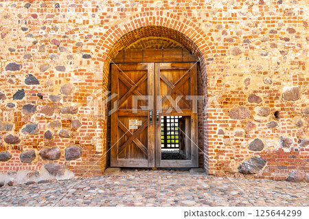 Mir Castle majestic fortification fortress monument inside courtyard door Belarus. 125644299