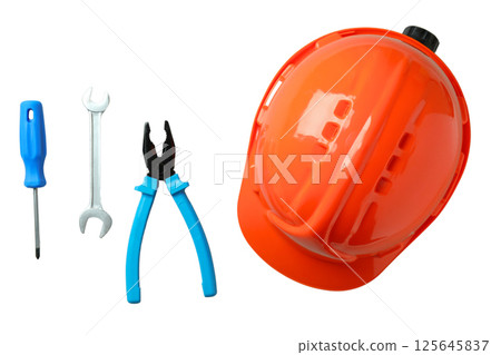 Safety helmet and tools represent Labor Day spirit and unity, isolated on white Safety helmet and tools represent Labor Day spirit and unity, isolated on white 125645837